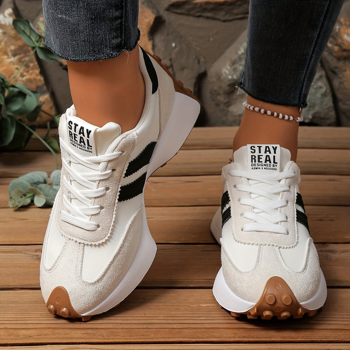 The Platform Sneaker by Mila and June — trendy thick-sole sneaker with subtle striped detail